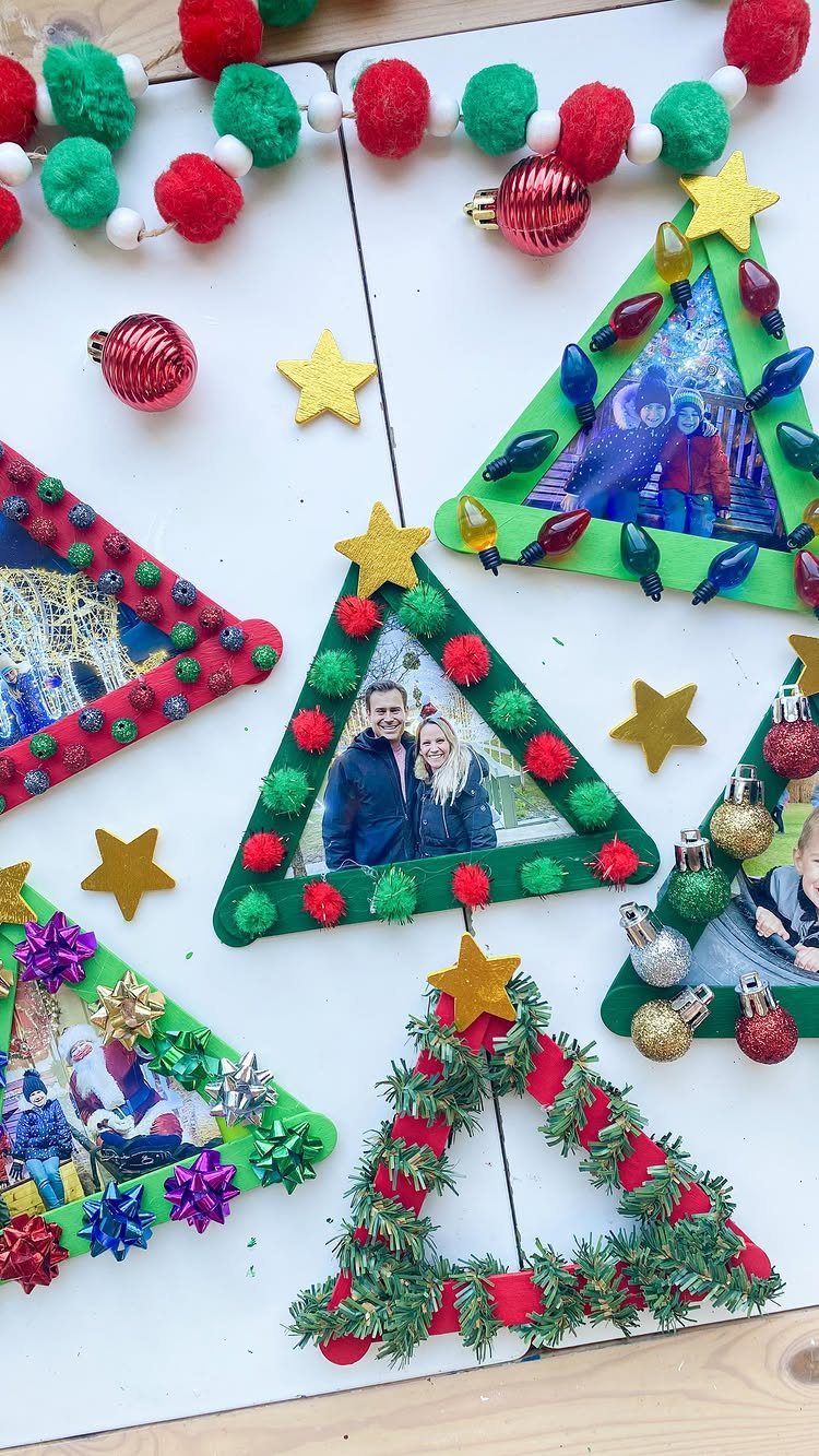 12 Christmas Family Craft Ideas: Projects for All Ages 8 Triangular craft stick ornaments decorated with pom-poms, stars, and lights containing family photographs.