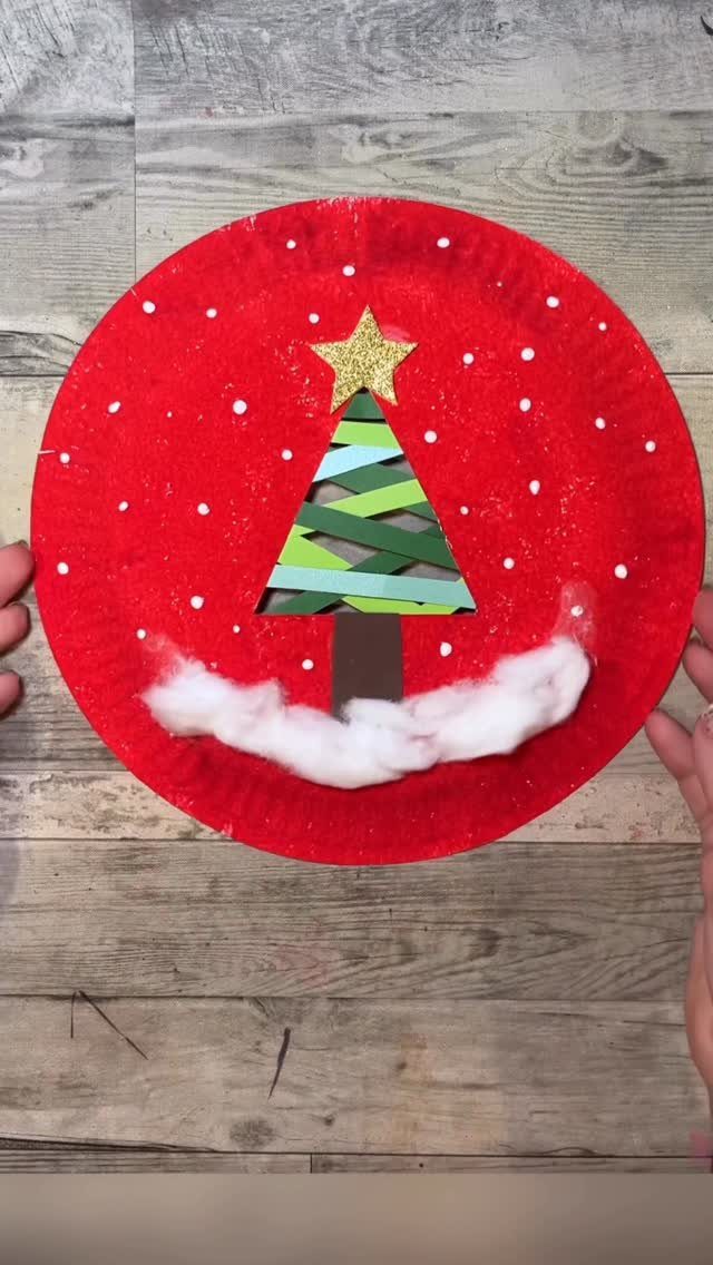 12 Christmas Family Craft Ideas: Projects for All Ages 6 Red paper plate craft with a colorful paper strip Christmas tree and white cotton at the base.