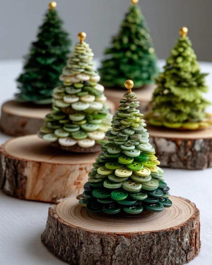 Small decorative Christmas trees crafted from stacked green and white buttons on wooden bases.