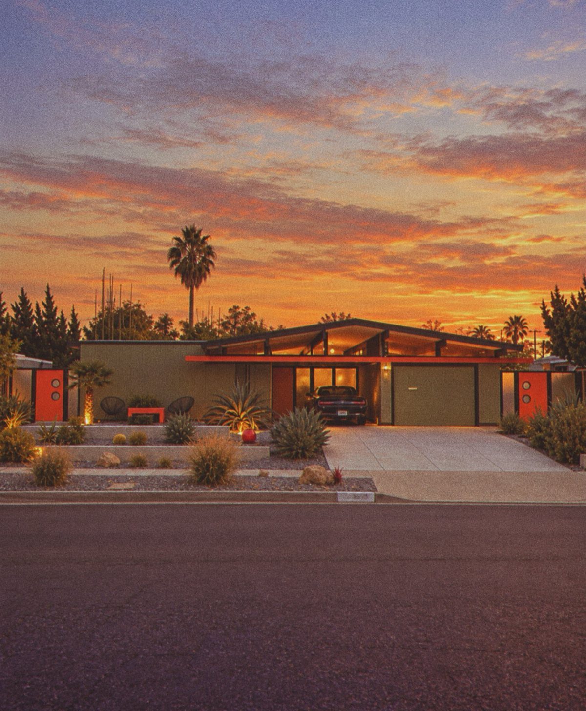 Exterior Color Ideas for 6 Home Styles 2 Mid-century modern house with olive green walls and orange accents under a colorful sunset sky.