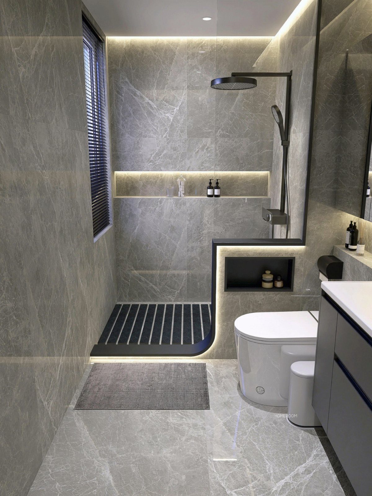 Garage to Bedroom Ideas: 7 Layouts Worth the Conversion Work 6 Modern small bathroom with grey marble tiles, a walk-in shower, and a white toilet.